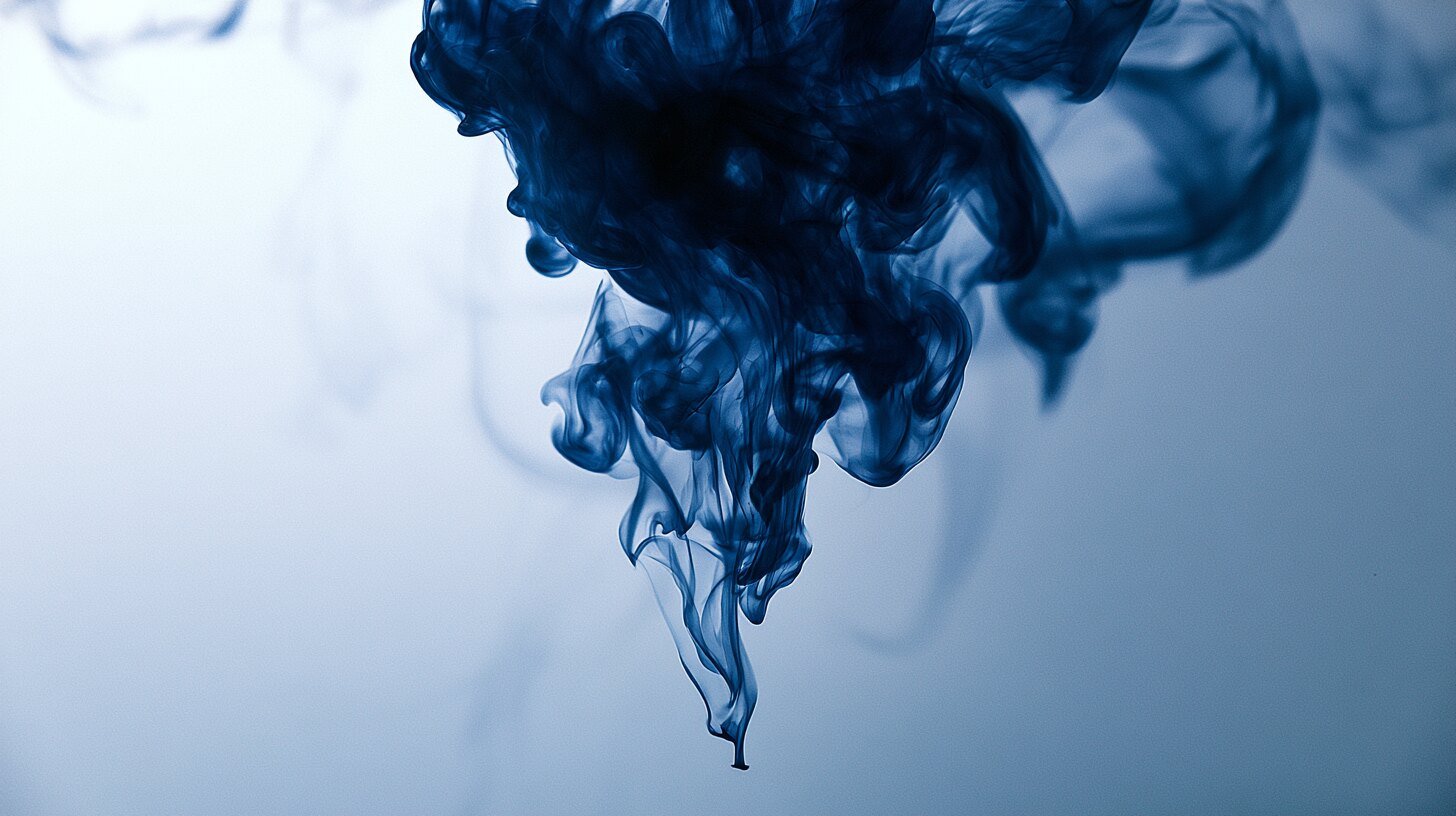A dense blue column thinning into fine threads